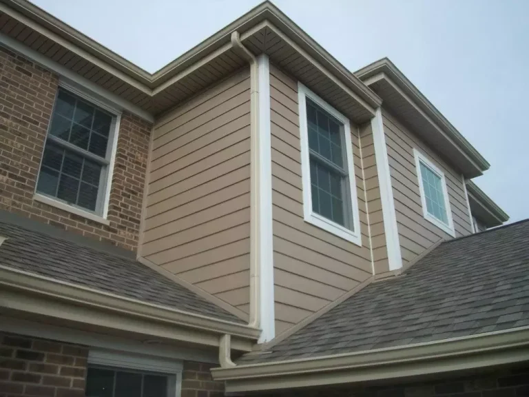 house with a brown siding installation