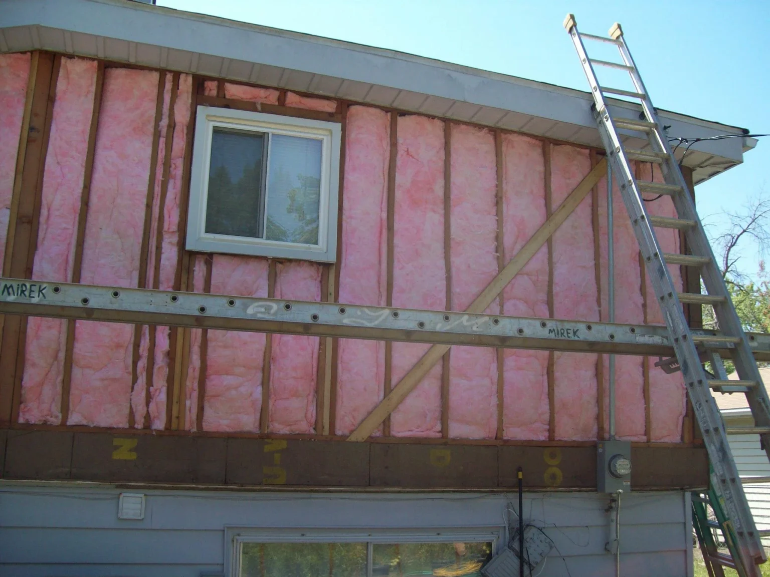 Insulating house during siding installation