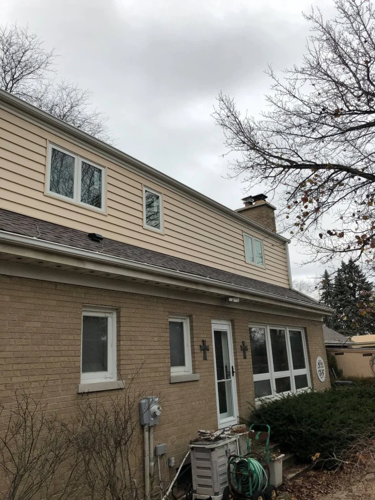 completed siding replacement on house with insulated siding